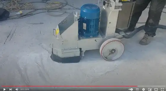 Grinding concrete flooring using 415v 3 phase Single headed diamond floor grinder” width=