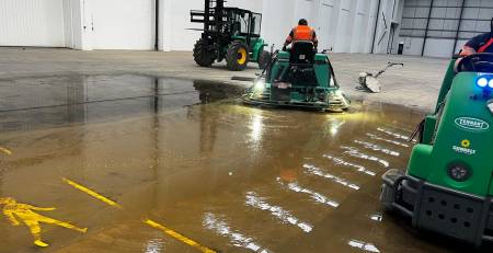 Industrial concrete polishing using a power trowel for large areas quickly